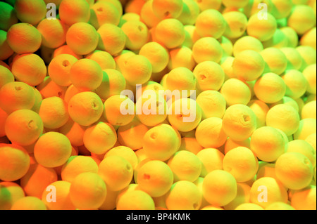 https://l450v.alamy.com/450v/bp4kmk/anti-moth-ball-texture-in-yellow-and-green-light-bp4kmk.jpg