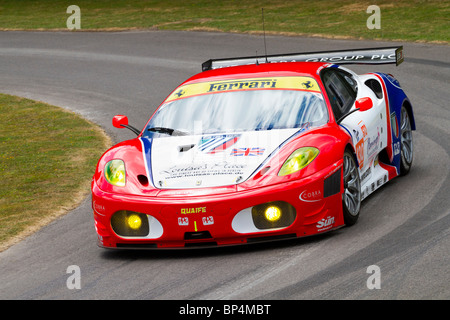 2010 Ferrari F430 endurance racer with driver Andrew Kirkaldy at the 2010 Goodwood Festival of Speed, Sussex, England, UK. Stock Photo