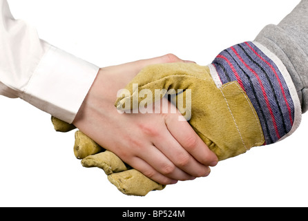 Industry worker with glove shakes hands with businessman Stock Photo