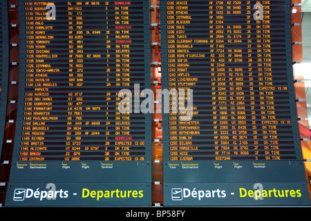 large plane departure board at paris airport Stock Photo