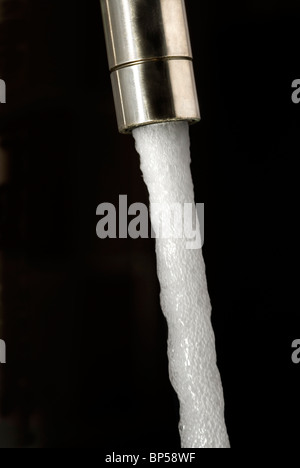 Running water from a tap (faucet) Stock Photo