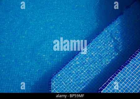 Steps leading into a swimming pool at a holiday resort in Portugal Stock Photo