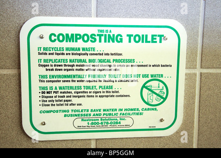 Sign by a composting toilet, Arizona, USA; concept of Sustainability Stock Photo