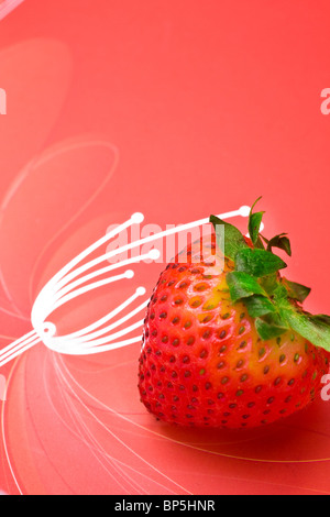 Single fresh red strawberry on simple background Stock Photo - Alamy