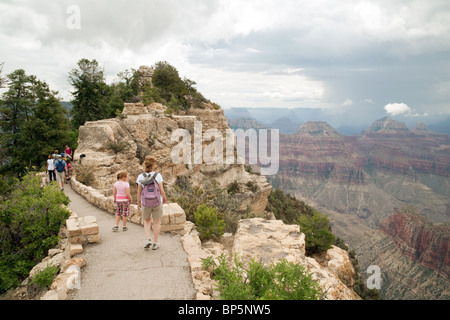 Tourists at Bright Angel Point, North Rim, Grand Canyon park, Arizona, USA Stock Photo