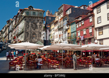 A street cafe in Oporto, Portugal. The Ribeira district Stock Photo