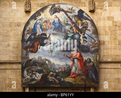 Salamanca, Spain.  Painting in the New Cathedral of The Plague in Milan with San Carlos Borromeo by Francisco Camilo. Stock Photo