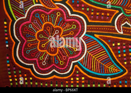 Traditional hand made Panamanian handicrafts. Colorful hand stitched Kuna Indian mola. Property Release. Stock Photo