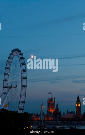 Millennium wheel and Houses of Parliament at dusk, London, UK. Stock Photo