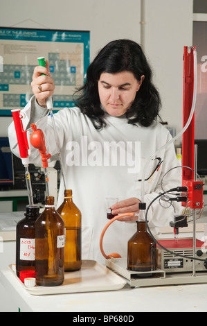 Chemist working at Adega Cooperativa de Borba winery lab, Alentejo, Portugal Stock Photo