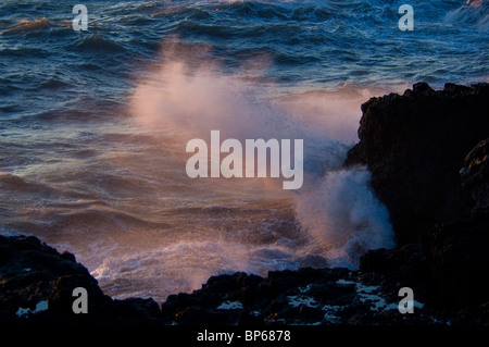 Waves crashing on coastal rock at sunset, Shelter Cove, on the rugged Lost Coast, Humboldt County, California Stock Photo