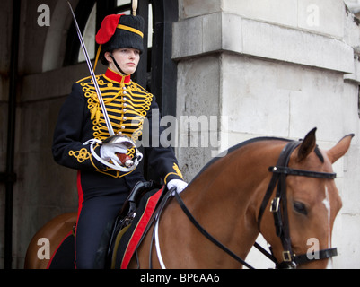 Portrait of a female Horse Guard at Household Cavalry Barracks, Whitehall, London, England, UK Stock Photo