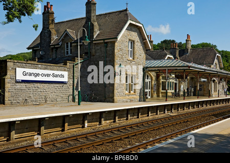 Grange-over-Sands railway train station platform track line in summer Cumbria England UK United Kingdom GB Great Britain Stock Photo