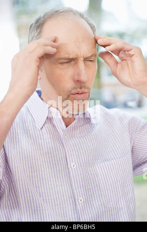 Man suffering from a headache Stock Photo