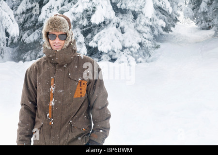 Young man in winter clothes Stock Photo