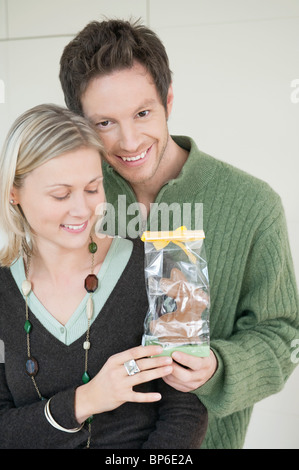 Man giving a present to a woman Stock Photo