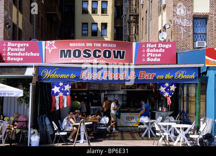 Brighton Beach Brooklyn New York People sitting in a Russian restaurant on the boardwalk Little Odessa by the Sea. Heat wave.USA Stock Photo