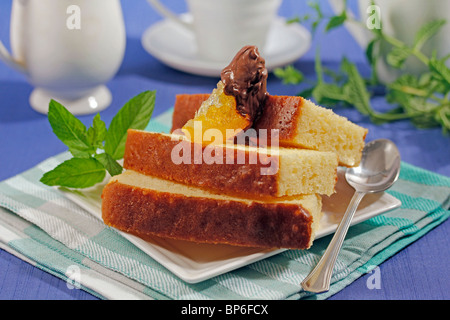 Orange sponge cake. Recipe available. Stock Photo