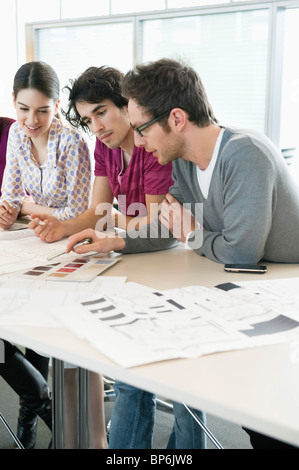 Business executives discussing in an office Stock Photo