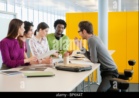 Business executives discussing in an office Stock Photo