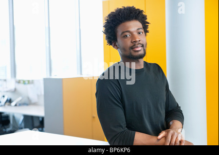 Businessman standing in an office Stock Photo