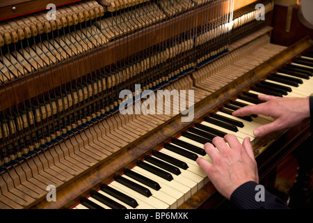 A man playing an organ, close up of hands Stock Photo