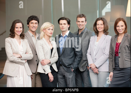 Business executives standing together Stock Photo