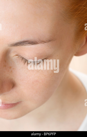 Detail of a redheaded woman's face Stock Photo