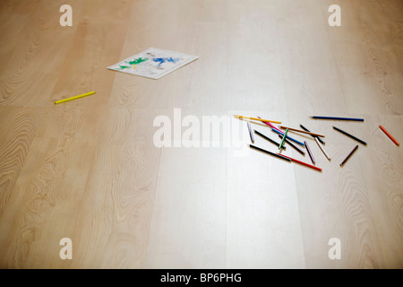 A coloring book page and colored pencils, still life Stock Photo