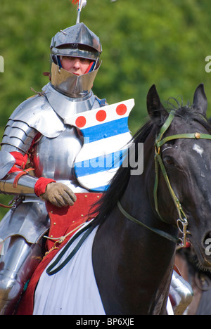 medieval knight on horse back at blasts from the past broadlands romsey Stock Photo