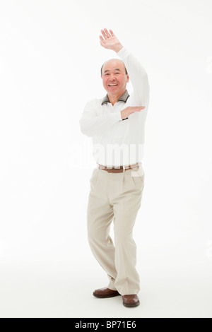 Portrait of senior man posing on white background Stock Photo - Alamy