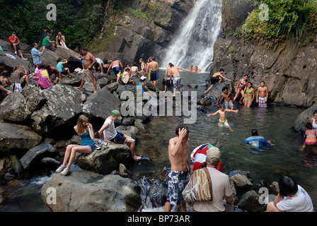 locals and tourists mingle at La Mina waterfall, El Yunque, rain forest,Puerto Rico, Stock Photo