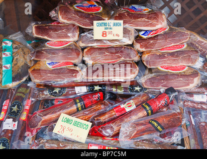 Salamanca, Salamanca Province, Spain. Display of dried and smoked meats in delicatessen window. Stock Photo