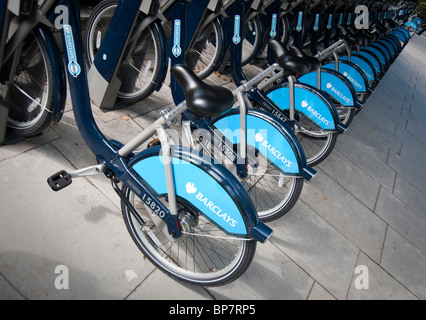 Barclays Cycle Hire Scheme London bikes lined up in their racks Stock Photo