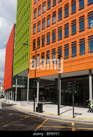 Piano's Colourful Facade. Using bright primary colours architect Piano breaks up the facade of this huge development Stock Photo