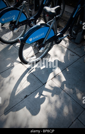 Barclays Cycle Hire Scheme London bikes lined up in their racks Stock Photo