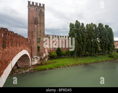 Ponte CastelVecchio in Verona with battlements against the cloudy sky Stock Photo