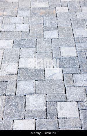 Gray interlocking paving stone driveway from above Stock Photo