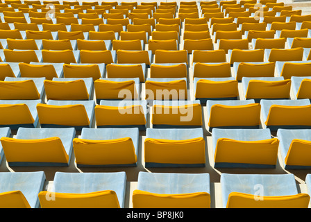 Yellow seats in sports city stadium Beirut Lebanon Stock Photo