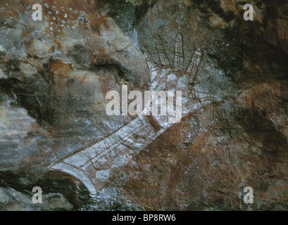 Aborigine Cave Paintings on a Stone Wall in Australia Stock Photo