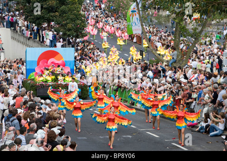 Dancers and Floral Float at Madeira Flower Festival Parade, Funchal, Madeira, Portugal Stock Photo