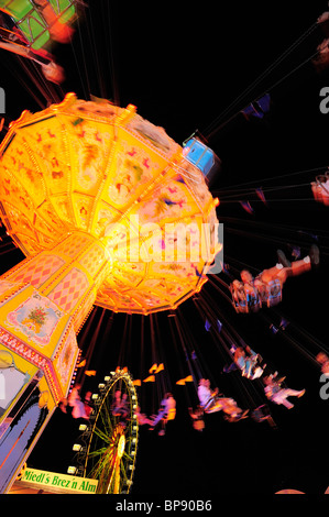 Illuminated chairoplane, autumn  festival, Rosenheim, Upper Bavaria, Bavaria, Germany Stock Photo