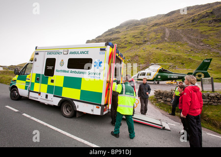 Emergency services attend a motorbike crash on Kirkstone Pass in the Lake District Stock Photo