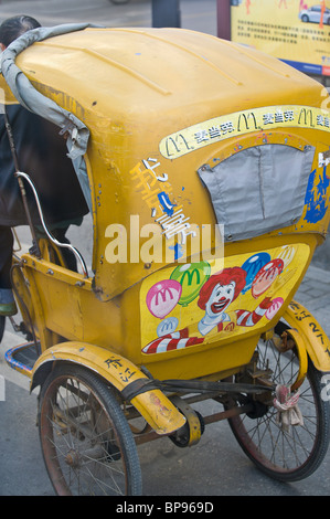 China, Suzhou. Rickshaw transportation street Stock Photo