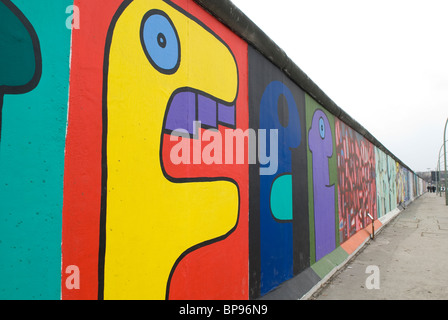 Paintings on the Berlin wall at the East side gallery Berlin city Germany Stock Photo