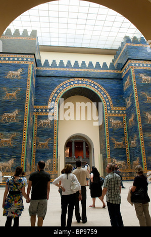 Visitors looking at Ishtar Gate from Babylon at Pergamon Museum in Berlin Germany Stock Photo
