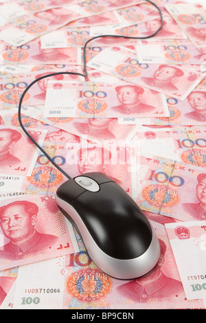 Chinese money and Computer Mouse, Business Concept Stock Photo
