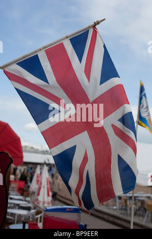 The Union flag hangs on the side of a shop in Brighton Stock Photo