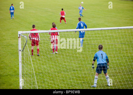 Ambleside FC playing Ulverston Town football club at Ambleside's football pitch, Lake District, UK. Stock Photo