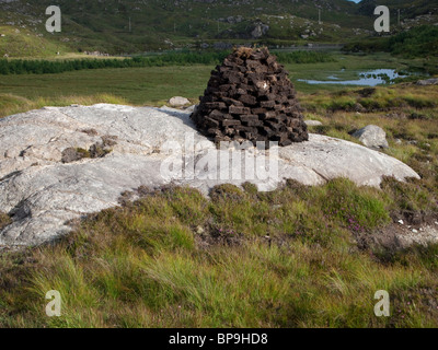 Stack of Cut Peats, Isle of Harris, Scotland Stock Photo